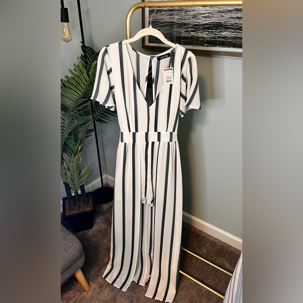 Striped romper (shorts and draped skirt surrounding in back).